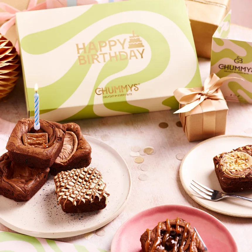 Chummy's brownie box on a cake stand