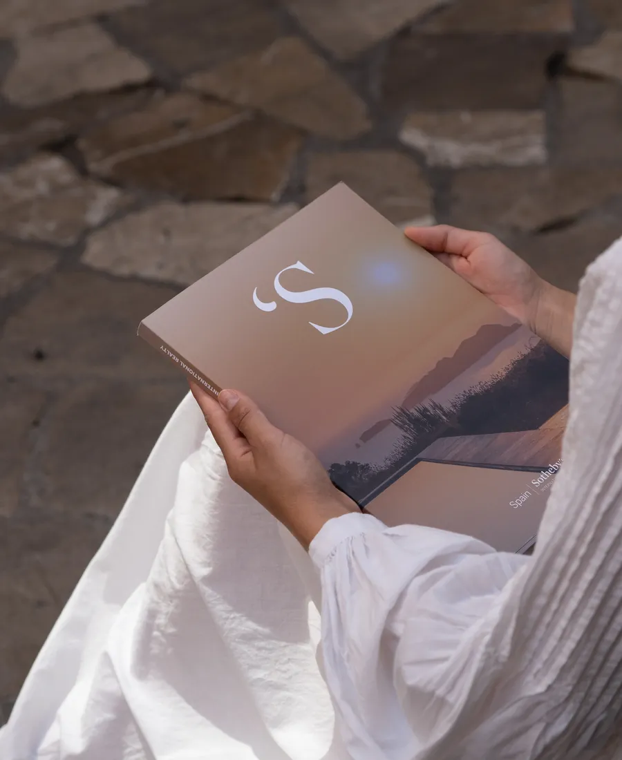 A buyer reviewing the Sotheby's property portfolio